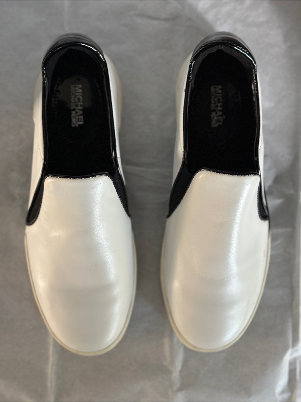 Michael Kors White and Black Slip-On Sneakers